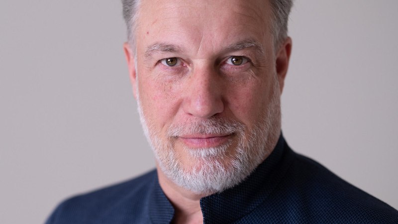 Nahaufnahme eines Mannes mit grauem Bart und kurzem Haar, der freundlich in die Kamera blickt., &copy; Touristik Bad Wildbad GmbH