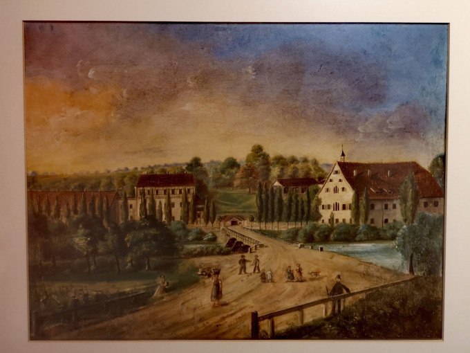 Ein Gem&auml;lde zeigt eine l&auml;ndliche Szene mit alten Geb&auml;uden, B&auml;umen und Menschen auf einem Weg. Der Himmel ist teils bew&ouml;lkt, teils klar., &copy; Stadt G&ouml;ppingen