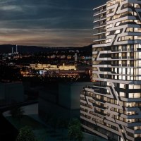 Ein modernes Hochhaus mit einzigartigem Design bei Nacht, beleuchtet, mit einer Stadtlandschaft im Hintergrund., © Jaz Hotel Stuttgart Ein modernes Hochhaus mit einzigartigem Design bei Nacht, beleuchtet, mit einer Stadtlandschaft im Hintergrund., © Jaz Hotel Stuttgart