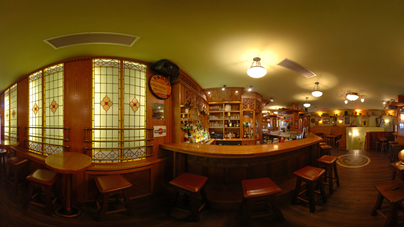 Gemütliches Irish Pub mit Holzmöbeln, Bar und dekorativen Glasfenstern. Warme Beleuchtung und rustikale Atmosphäre laden zum Verweilen ein., © Christian Neutelings Towers - Irish Pub Gemütliches Irish Pub mit Holzmöbeln, Bar und dekorativen Glasfenstern. Warme Beleuchtung und rustikale Atmosphäre laden zum Verweilen ein., © Christian Neutelings Towers - Irish Pub