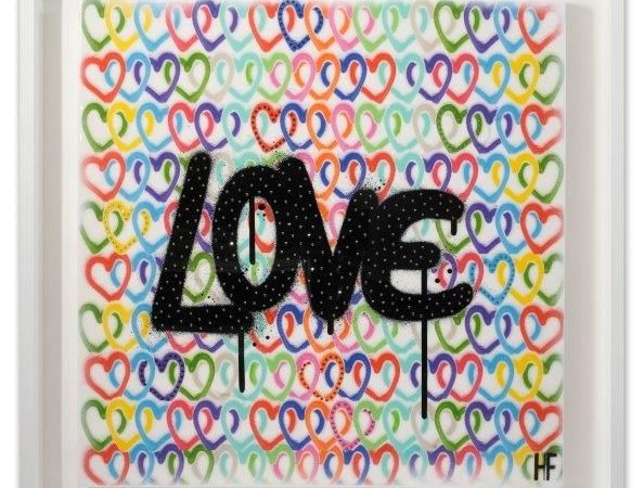 Schwarzes 'LOVE' auf buntem Herz-Hintergrund in einem wei&szlig;en Rahmen. Signiert mit 'HF'., &copy; Love Reloaded &copy; Heather Fazzino