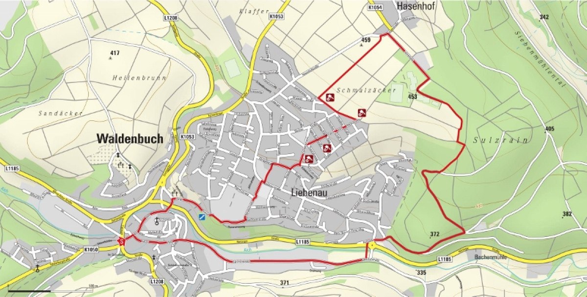 Karte von Waldenbuch mit einem rot markierten Wanderweg, der durch die Stadt und umliegende Felder und Wälder führt. Straßen und Orte sind beschriftet., © Natur.Nah. Schönbuch & Heckengäu Karte von Waldenbuch mit einem rot markierten Wanderweg, der durch die Stadt und umliegende Felder und Wälder führt. Straßen und Orte sind beschriftet., © Natur.Nah. Schönbuch & Heckengäu