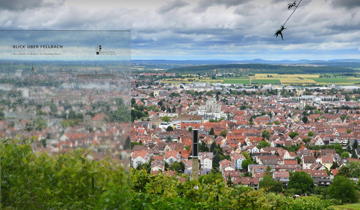 Panoramablick über Fellbach mit einem verregneten Informationsschild im Vordergrund. Die Stadt erstreckt sich unter einem bewölkten Himmel., © Remstal Tourismus e.V. Panoramablick über Fellbach mit einem verregneten Informationsschild im Vordergrund. Die Stadt erstreckt sich unter einem bewölkten Himmel., © Remstal Tourismus e.V.