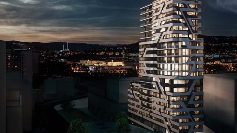 Ein modernes Hochhaus mit einzigartigem Design bei Nacht, beleuchtet, mit einer Stadtlandschaft im Hintergrund., © Jaz Hotel Stuttgart Ein modernes Hochhaus mit einzigartigem Design bei Nacht, beleuchtet, mit einer Stadtlandschaft im Hintergrund., © Jaz Hotel Stuttgart