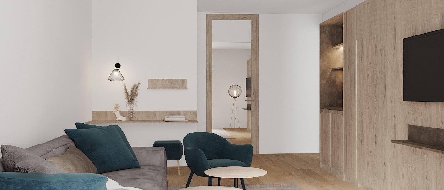 Moderne Hotelsuite mit grauem Sofa, blauen Kissen, Holzmöbeln und minimalistischer Dekoration. Elegantes Design mit warmen Holztönen., © LOOM Hotel & Skybar Moderne Hotelsuite mit grauem Sofa, blauen Kissen, Holzmöbeln und minimalistischer Dekoration. Elegantes Design mit warmen Holztönen., © LOOM Hotel & Skybar