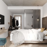 Modernes Hotelzimmer mit Doppelbett, grauen Vorhängen, TV, Kleiderstange und stilvoller Dekoration., © LOOM Hotel & Skybar